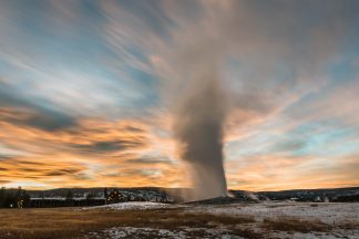 Old Faithful Geyser Sunset in Yellowstone Photograph